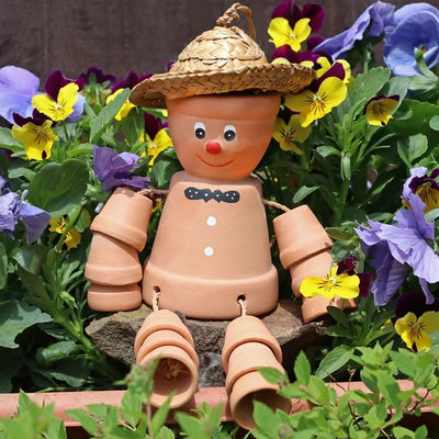 Terracotta Pot Man Daisy Devotion